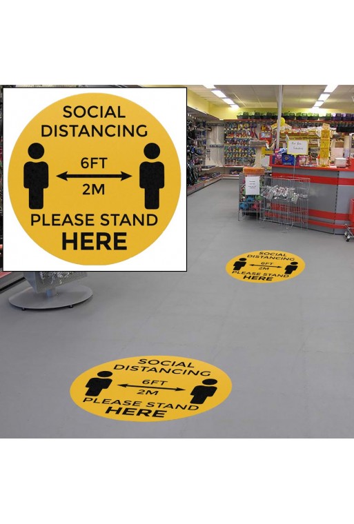 12" Circle "Social Distancing, Please Stand Here" Vinyl Floor Sticker on floor